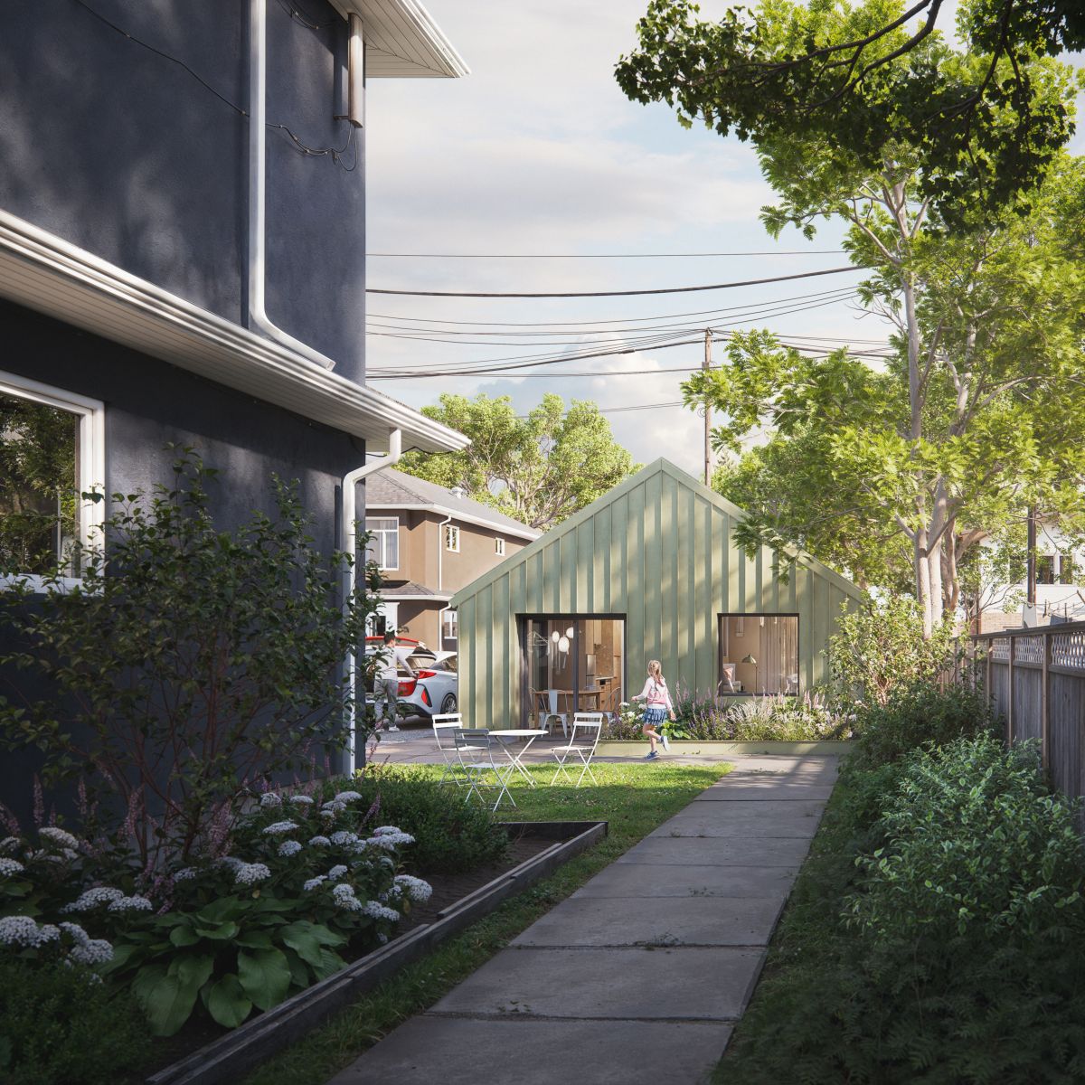 The 3D rendering shows a residential backyard during daytime. A concrete pathway runs from the foreground to the background, leading to a small, single-storey house painted in soft green with a gabled roof. This house has large glass doors and windows. 